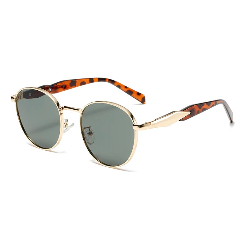 Bold round-frame sunglasses with tortoiseshell arms and metal accents, offering UV400 protection and retro style.