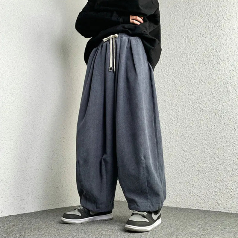 Arlo corduroy pants with wide-leg fit, adjustable drawstring, and deep pockets for a stylish, relaxed look.