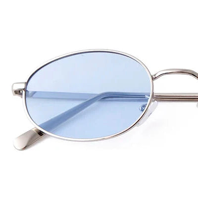 Orin Oval Frame Sunglasses with blue lenses and polished metallic finish, offering UV protection and ergonomic comfort.