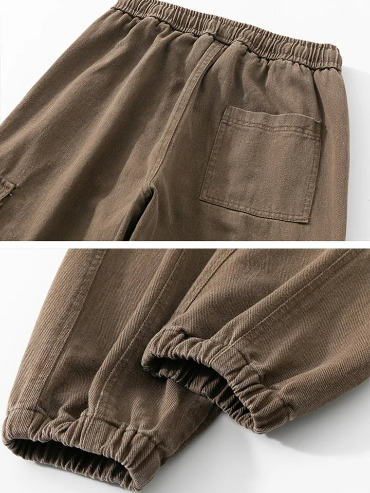 Lennox Cargo Joggers: heavyweight cotton blend with elastic cuffs and deep cargo pockets for functional style.