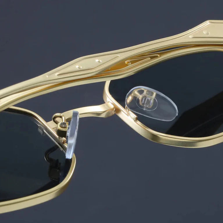 Close-up of Atlas Alloy Sunglasses featuring a geometric design and adjustable nose pads.