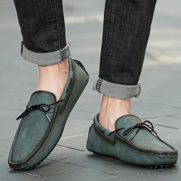 Man wearing Kingsley genuine leather loafers in a stylish casual outfit, showcasing breathable construction and advanced support.