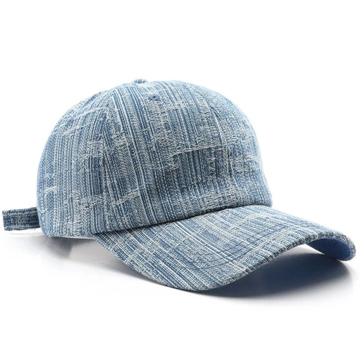 Wyatt Street Denim Cap in faded blue, showcasing vintage wash and distressed details for a rugged, casual style.