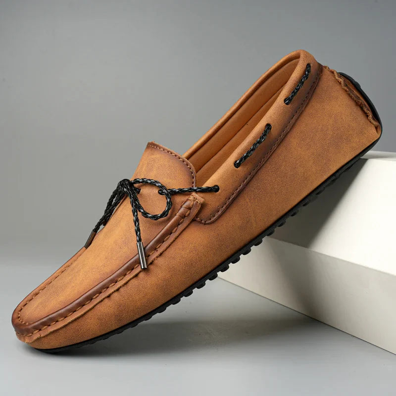 Kingsley genuine leather loafers in tan with black laces, designed for comfort and style.