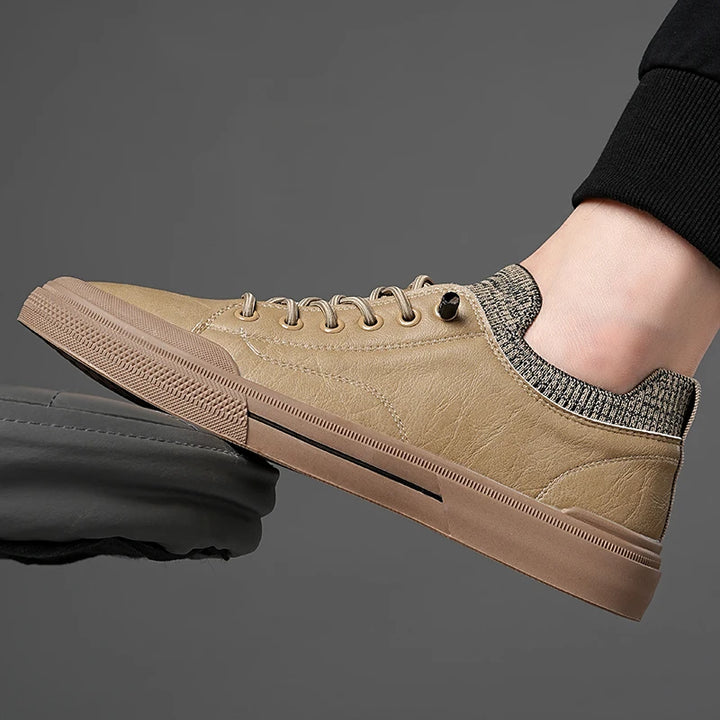 Prime Leather Knit Sneakers in beige with flexible knit collar and durable rubber sole, showcasing luxury and comfort.
