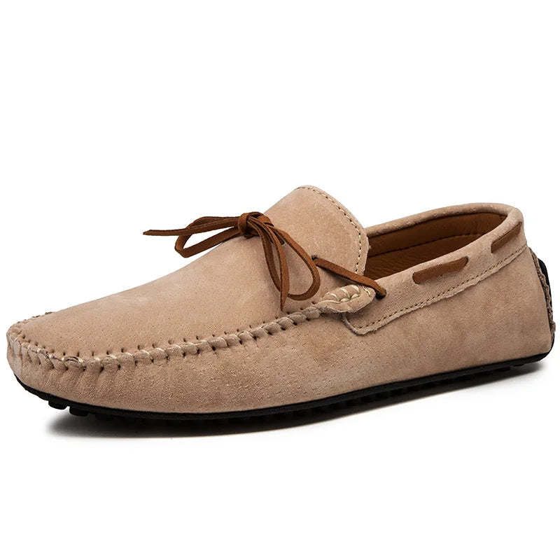 Monte Carlo genuine suede loafers featuring hand-stitched details and premium leather laces in a light beige color.