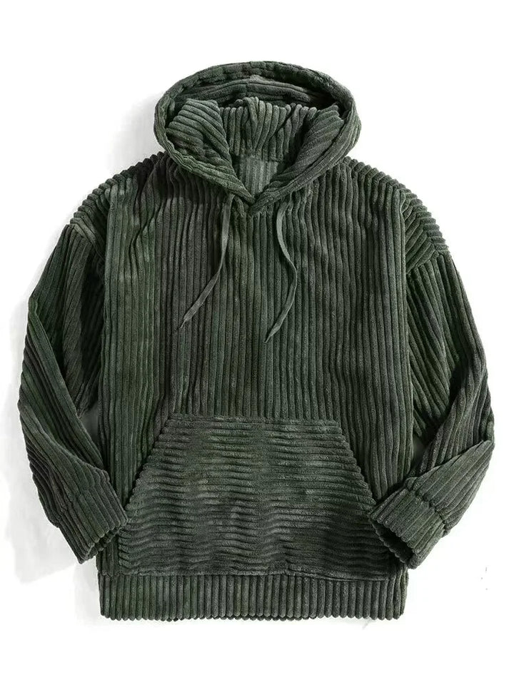 Summit Corduroy Hoodie in rich green with ribbed texture and spacious front pocket for ultimate comfort.