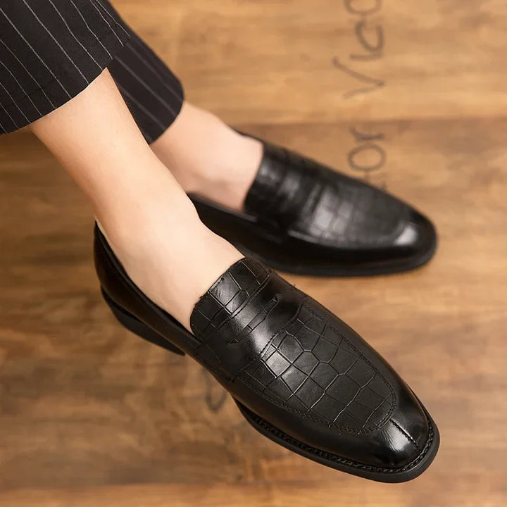 Lucera men's leather crocodile loafers with polished finish, featuring a cushioned insole and rubber outsole for comfort and grip.