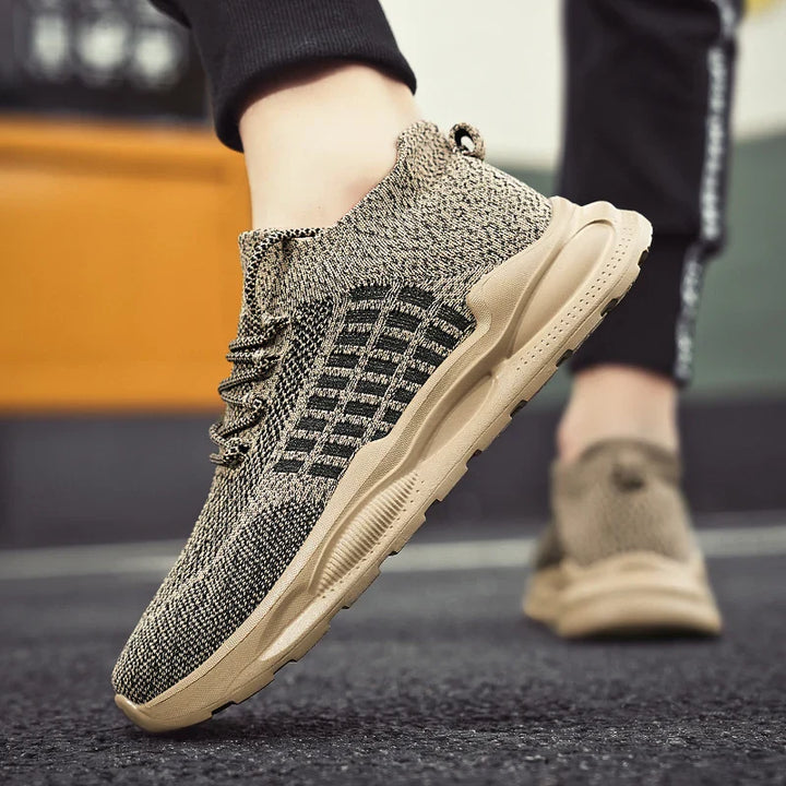 Brava Performance Mesh Sneaker in beige, featuring breathable knit fabric and a high-rebound midsole for comfort.
