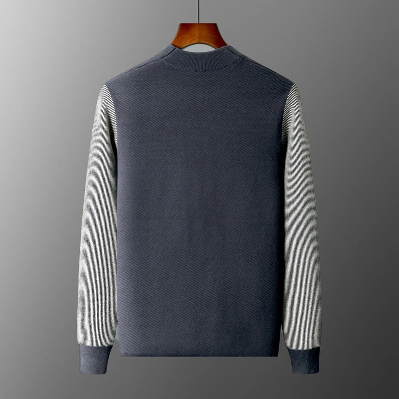 Back view of Rowan Merino Cardigan showcasing ribbed contrast sleeves and a clean silhouette.