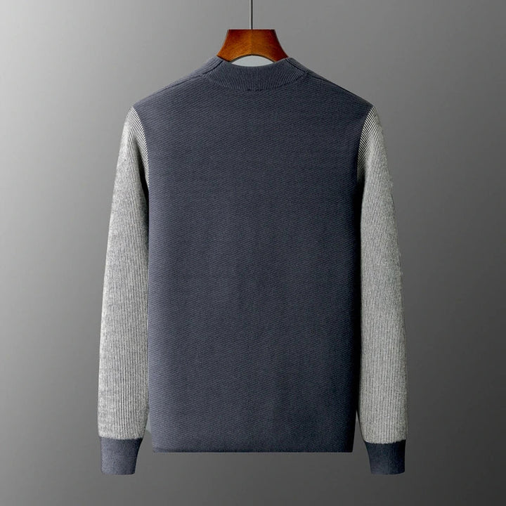 Back view of Rowan Merino Cardigan showcasing ribbed contrast sleeves and a clean silhouette.