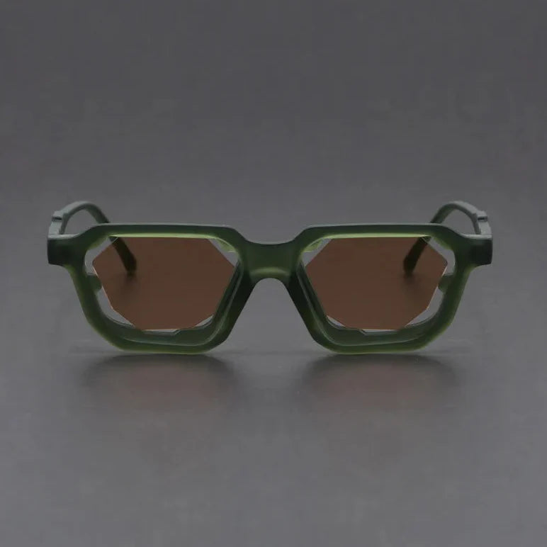 Vantor Sunglasses with sharp geometric frame and thick sculpted edges in green, offering UV400 protection and ergonomic fit.