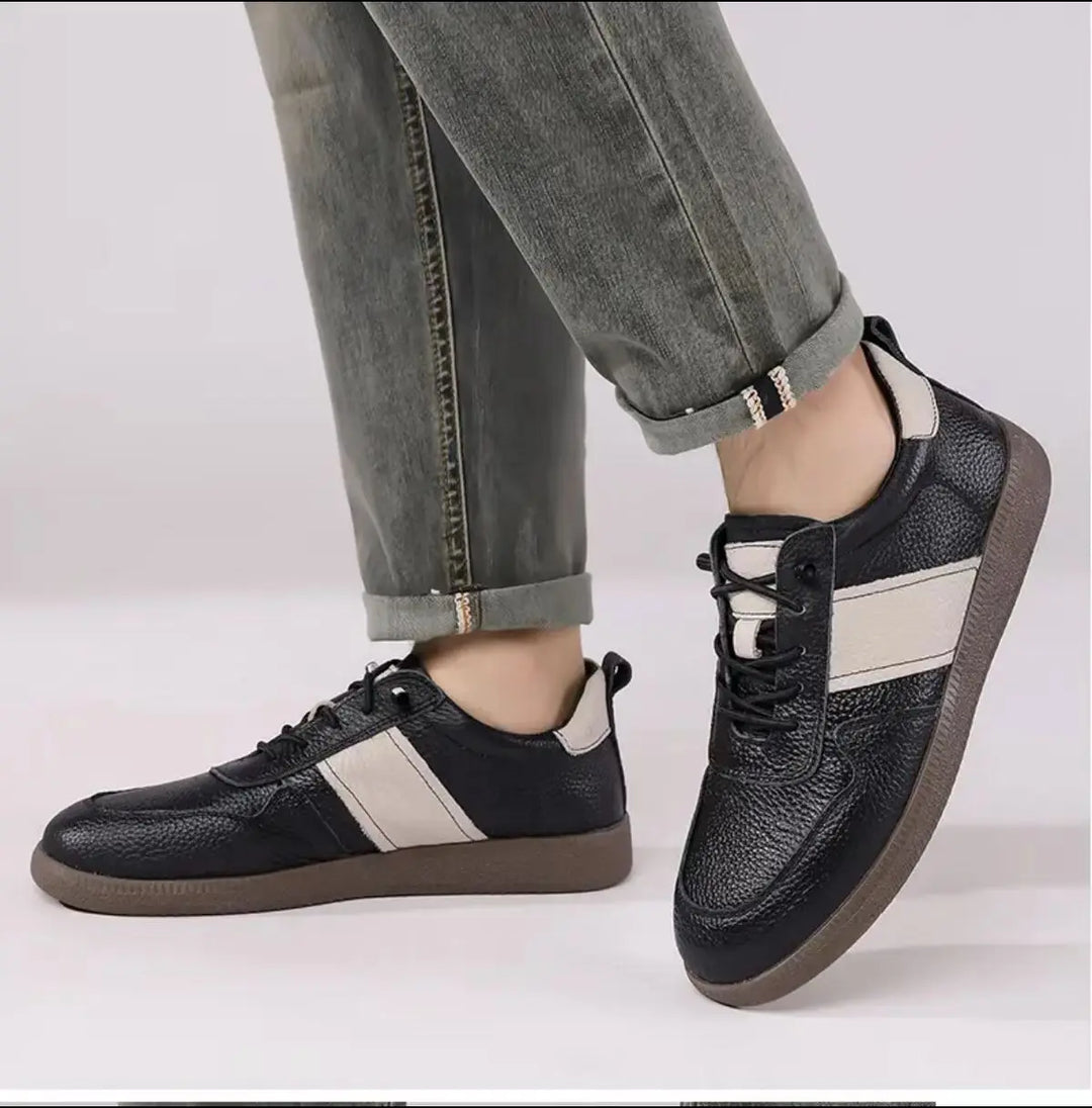 Axel Street Comfort Sneakers in black leather with contrasting side panel design, perfect for modern stylish men.