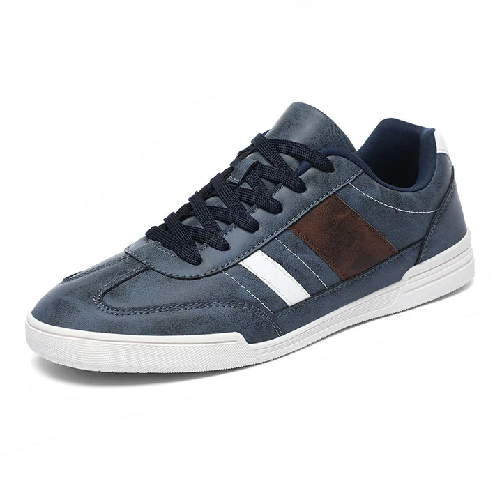 Rival Sport Sneakers with retro style, featuring blue leather, contrast paneling, and a cushioned insole for comfort.