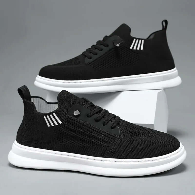Oswin Flex Fit Sneakers in black featuring breathable knit upper and slip-on design for comfortable, everyday wear.