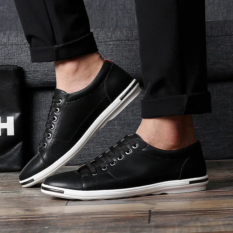 Paxton Low-Top Comfort Sneakers with black leather upper and white sole, perfect for all-day comfort and versatile styling.