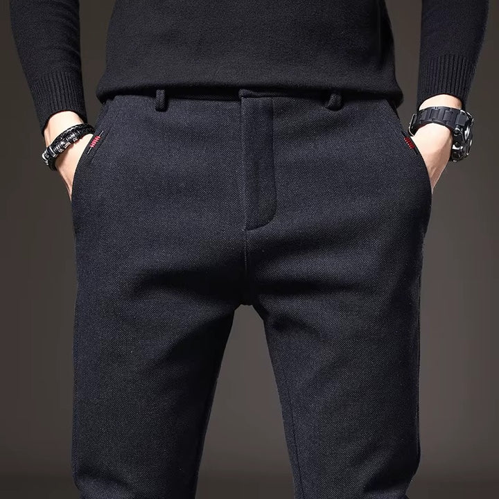 Henderson Slim-Fit Pants showcasing flexible, tailored fit in dark fabric, ideal for modern everyday wear.