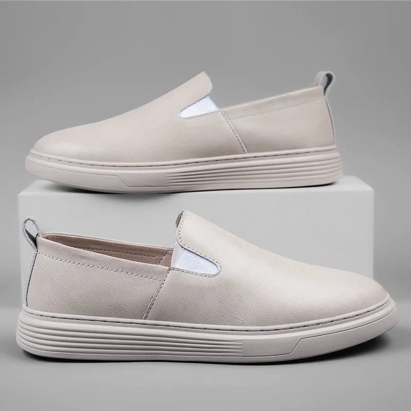 Duke Leather Slip-On Shoes in light gray, featuring a cushioned sole and easy slip-on design for versatile style.