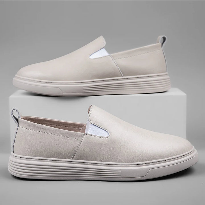 Duke Leather Slip-On Shoes in light gray, featuring a cushioned sole and easy slip-on design for versatile style.