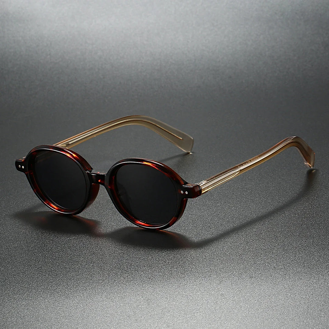 Sable round sunglasses featuring thick acetate frames and UV400-blocking lenses, sleek design, and durable craftsmanship.