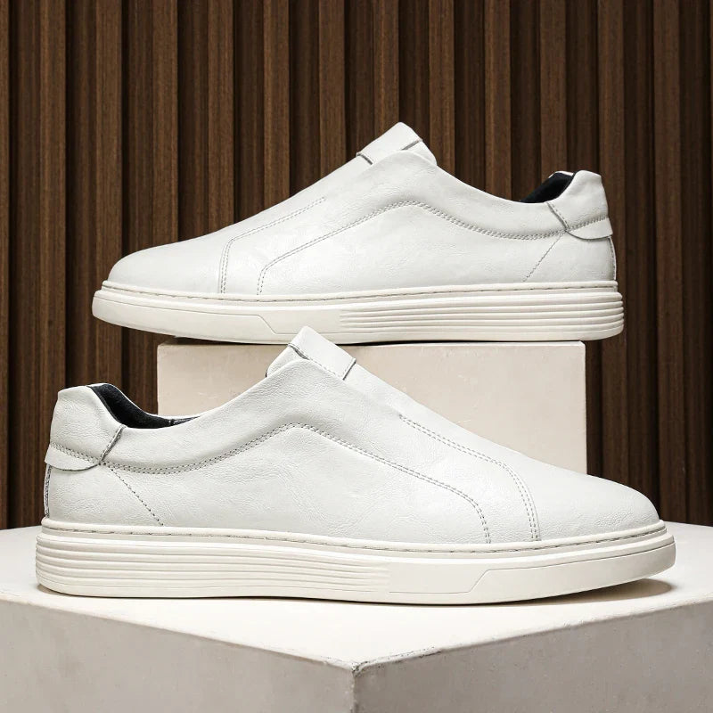 Alvio Genuine Leather Shoes in white, featuring slip-on design and cushioned insole for all-day comfort and style.