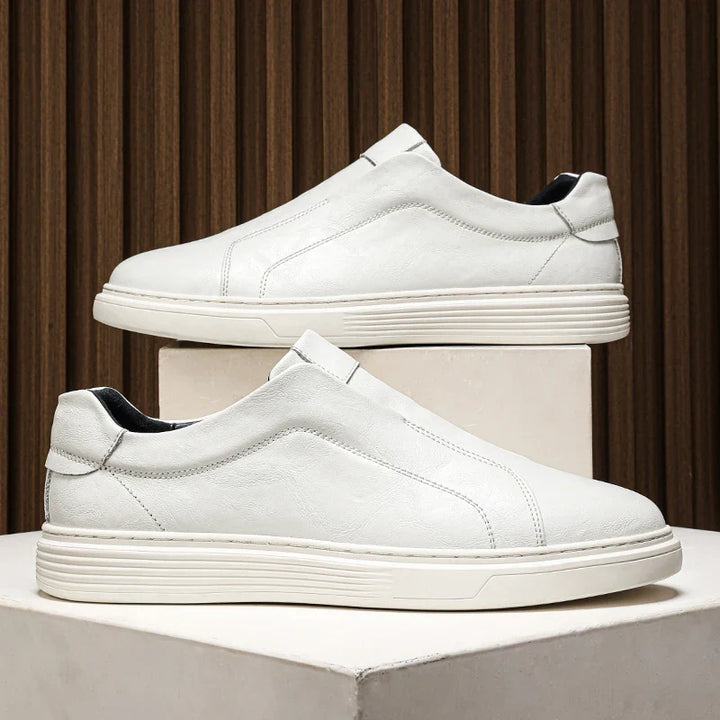 Alvio Genuine Leather Shoes in white, featuring slip-on design and cushioned insole for all-day comfort and style.