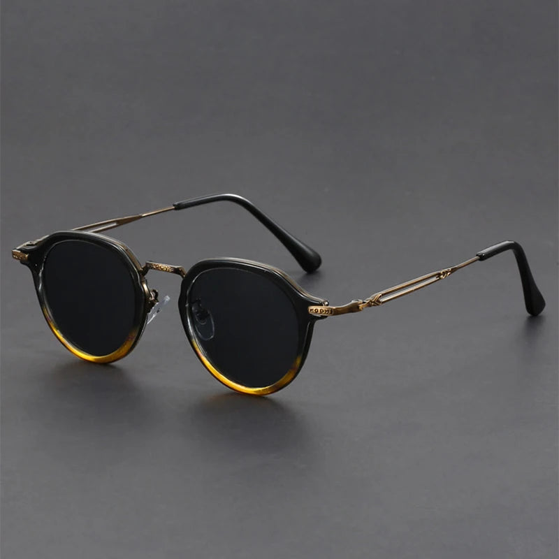 Vista Retro Shades with round metal frame, textured bridge, and UV400 lenses for sun protection and comfort.