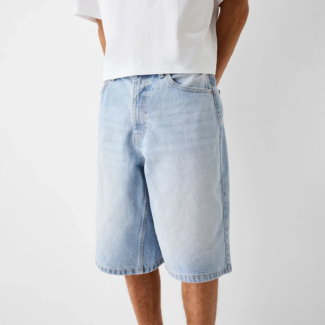 Kai Men's Straight Denim Shorts in softly washed midweight denim, featuring a structured knee-length fit for comfort and style.