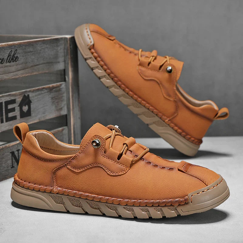 Vantage genuine leather shoes in tan color, featuring lace-up design and flexible rubber sole for comfort.