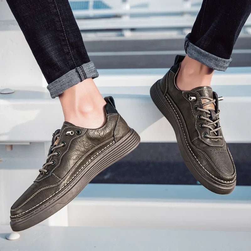 Alvo Genuine Leather Sneakers featuring artisanal hand-stitched details and a supportive sole, ideal for stylish comfort.