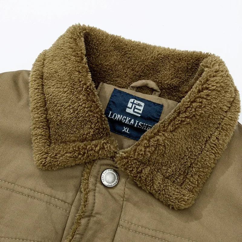Close-up of a brown fleece-lined jacket collar with a tag reading 'Longkaista XL'.