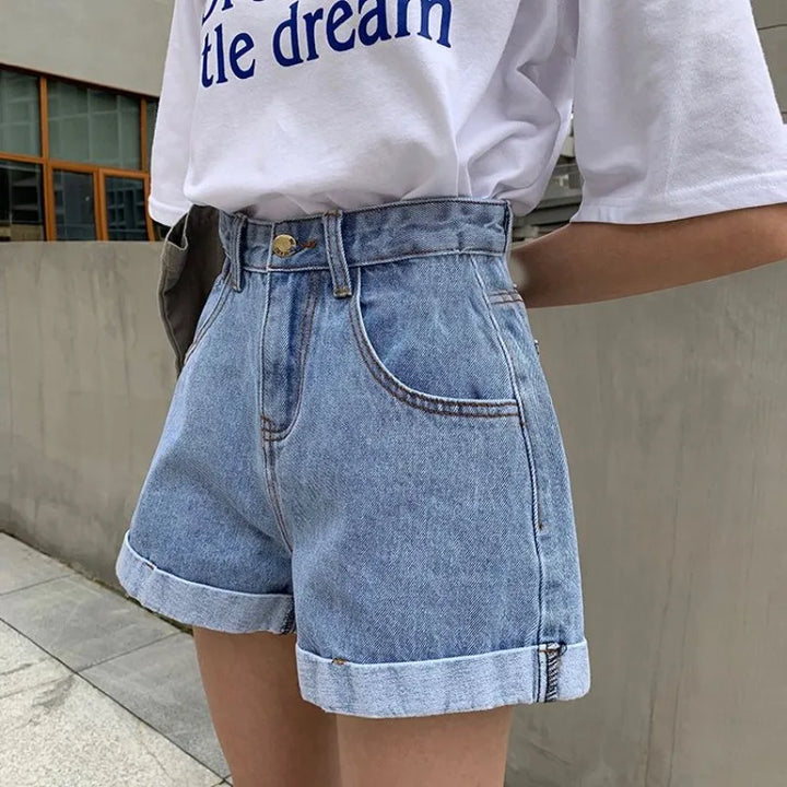 Sienna Retro Denim Shorts: High-waisted cuffed denim shorts in light blue, perfect for a vintage Y2K style.