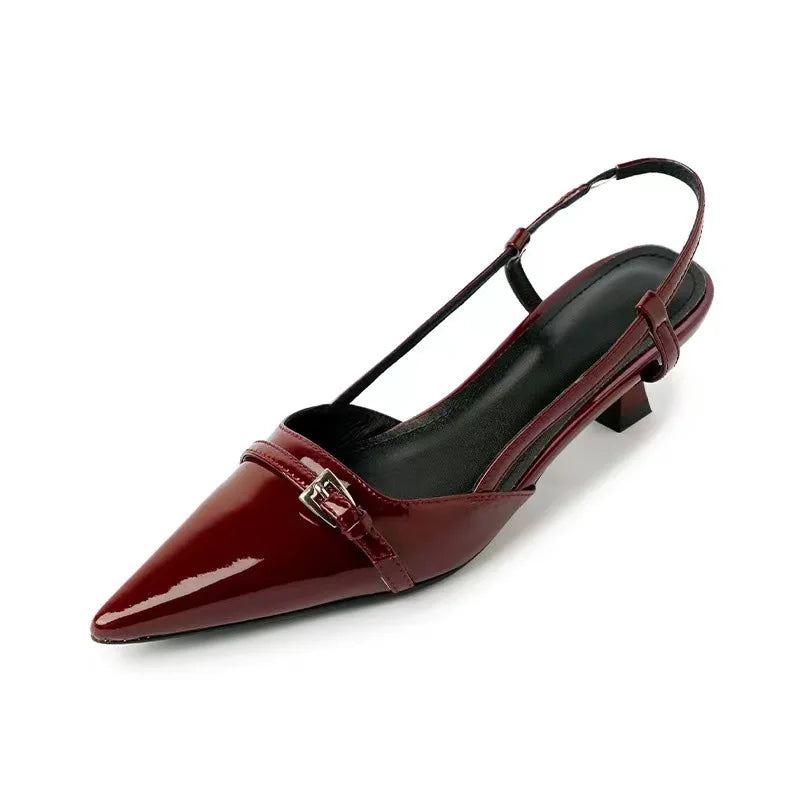 Shine Point Slingback Heels in glossy burgundy with pointed toe, flared mid-heel, and adjustable strap for stylish comfort.