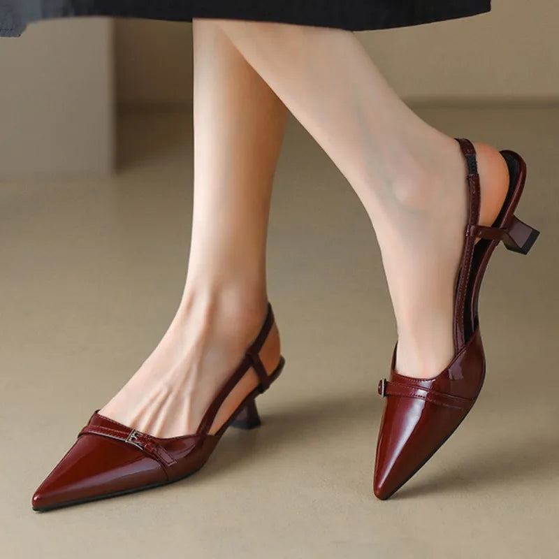 Shine Point Slingback Heels in glossy burgundy with pointed toe and flared heel for a stylish touch.