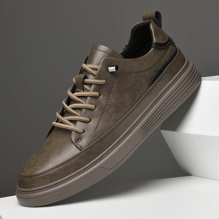 Genesis Leather Sneakers featuring genuine leather upper, cushioned interior, and durable rubber sole for versatile wear.