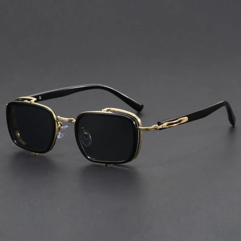 Elias Rectangle Frame Sunglasses featuring sleek black lenses and polished gold metal frames.
