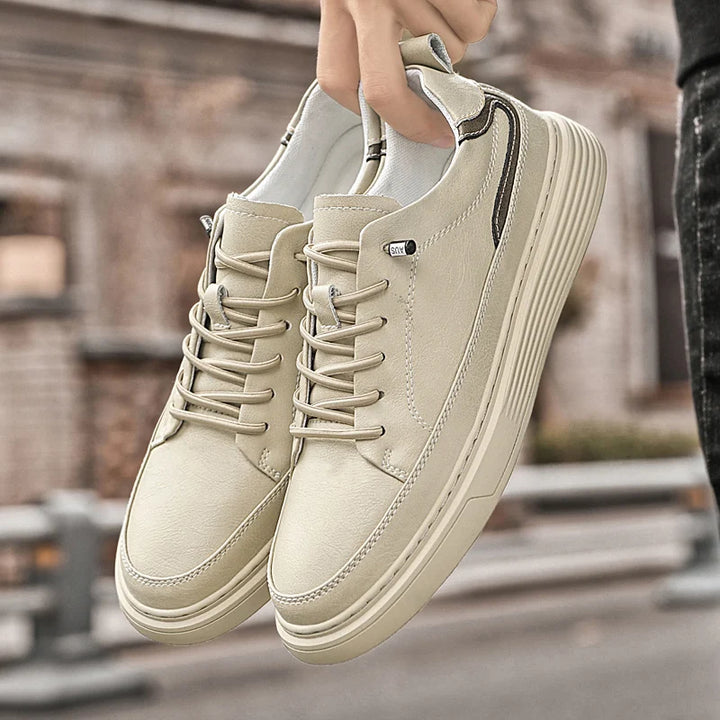 Genesis Leather Sneakers in beige, featuring genuine leather, cushioned interior, and durable rubber sole for style and comfort.