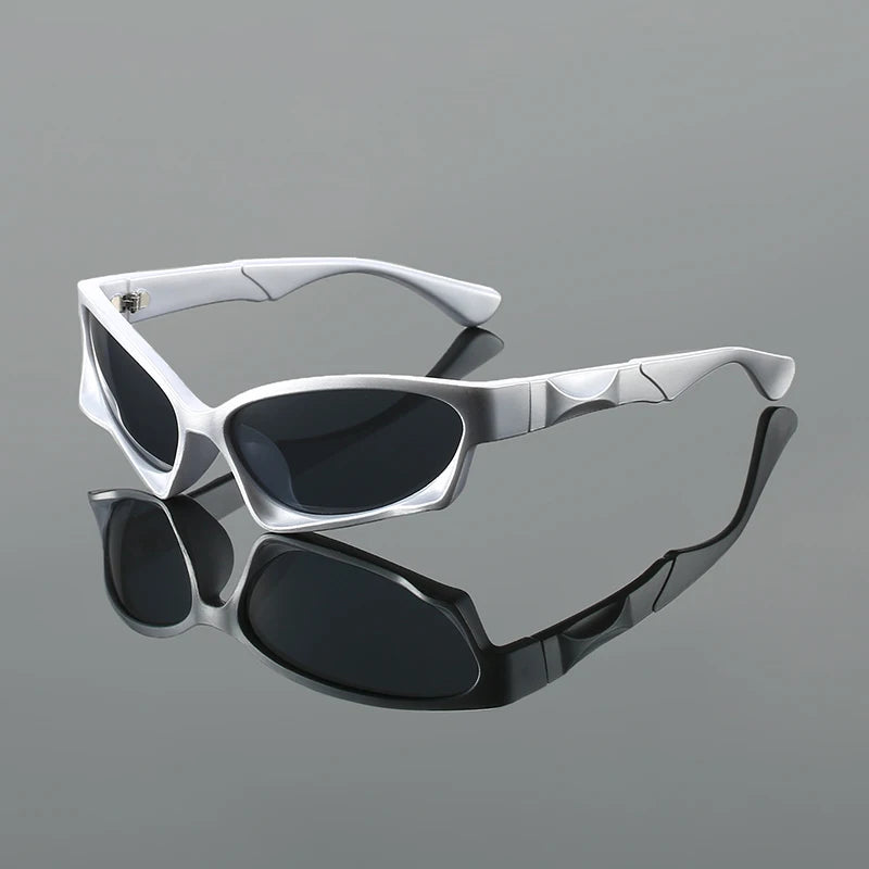Astro Sunglasses with a sleek angular frame and dark UV-protective lenses, perfect for athletic performance and style.