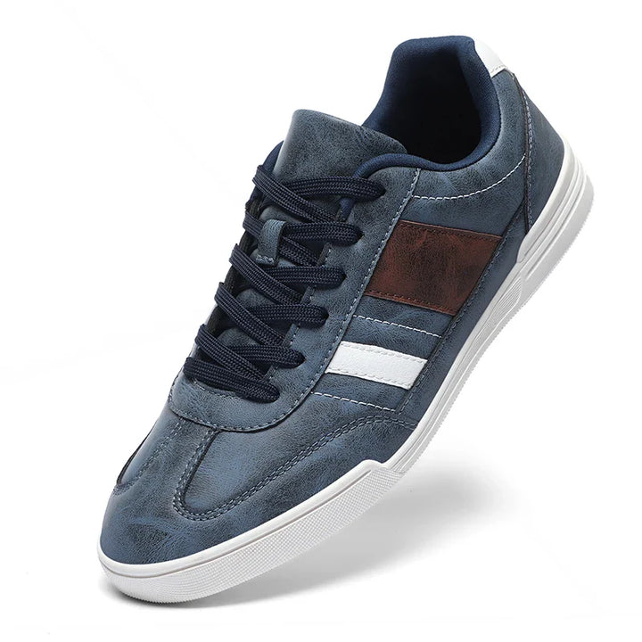 Rival Sport Sneakers in navy with brown and white contrast panels for retro style and comfort.