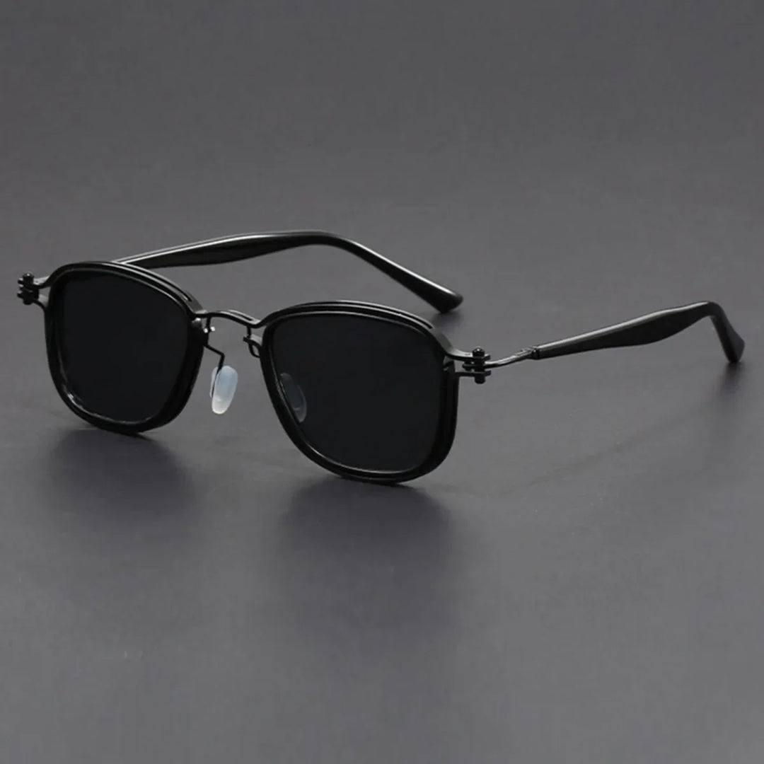 Chimera Round Frame Sunglasses in black, featuring glare-blocking lenses and adjustable nose pads.