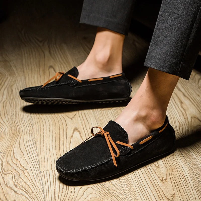 Monte Carlo genuine suede loafers featuring hand-stitched craftsmanship and premium leather laces in a stylish slip-on design.