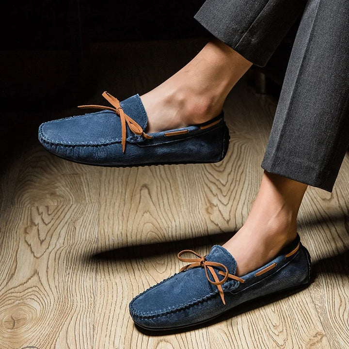 Monte Carlo genuine suede loafers with premium leather laces, showcasing hand-stitched craftsmanship and slip-on design.