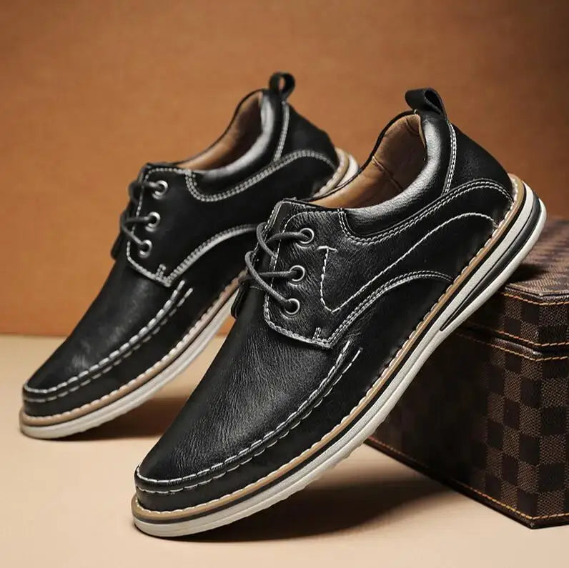 Luciano Genuine Leather Oxfords in black with contrast moc toe stitching and cushioned collar for comfort.