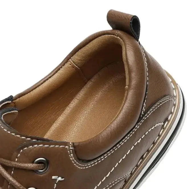 Close-up of interior of Luciano Genuine Leather Oxfords, featuring cushioned collar and clean stitching details.