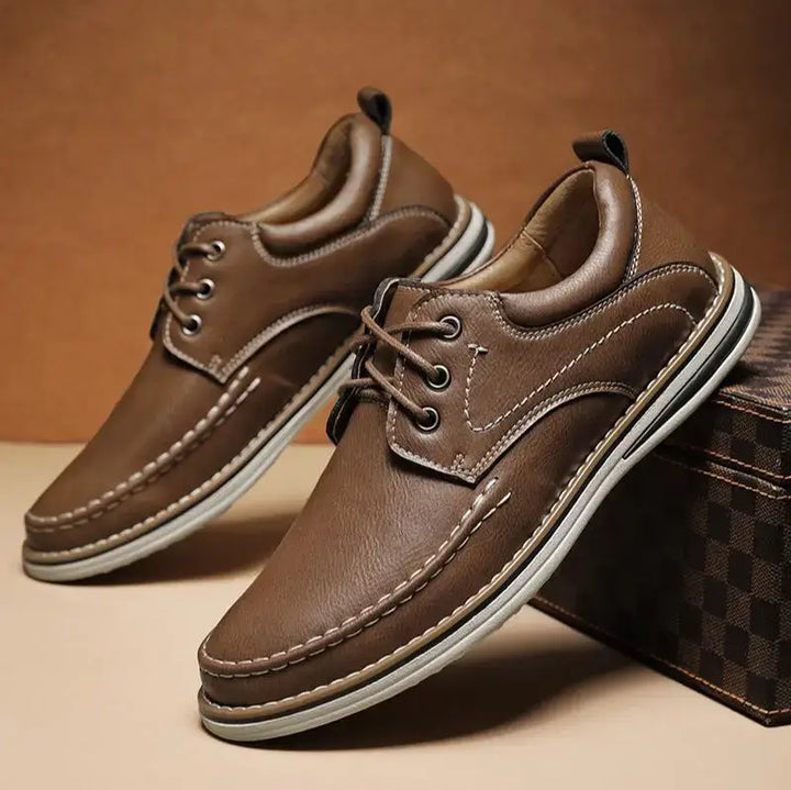 Luciano Genuine Leather Oxfords in brown with contrast moc toe stitching and cushioned collar for added comfort.