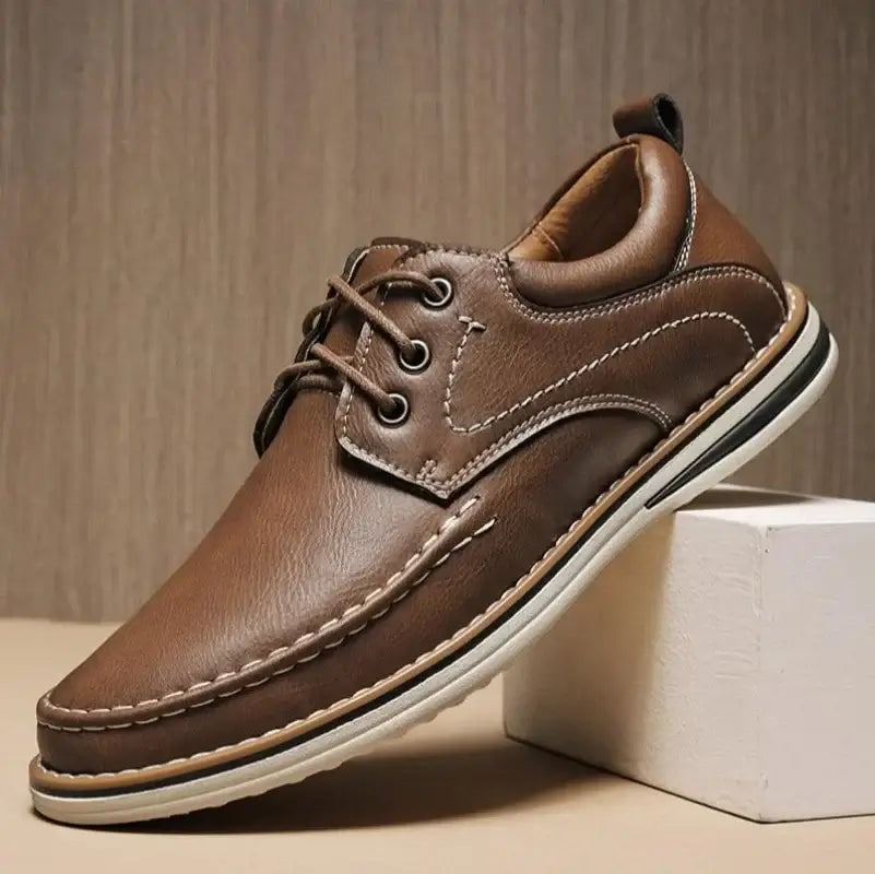 Luciano Genuine Leather Oxfords in brown with contrast stitching and cushioned collar for all-day comfort.