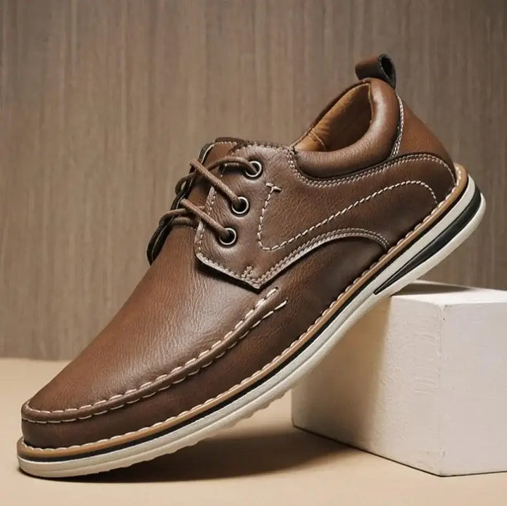 Luciano Genuine Leather Oxfords in brown with contrast stitching and cushioned collar for all-day comfort.