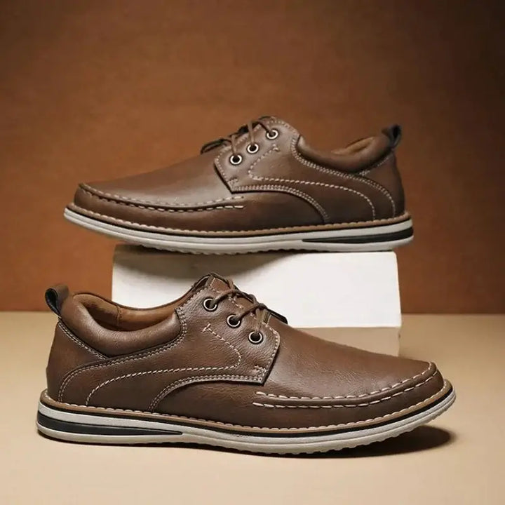 Luciano Genuine Leather Oxfords in brown, featuring contrast moc toe stitching and cushioned collar.