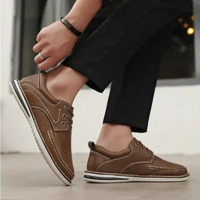 Luciano Genuine Leather Oxfords in brown with contrast stitching, showcasing the lace-up design and padded collar.
