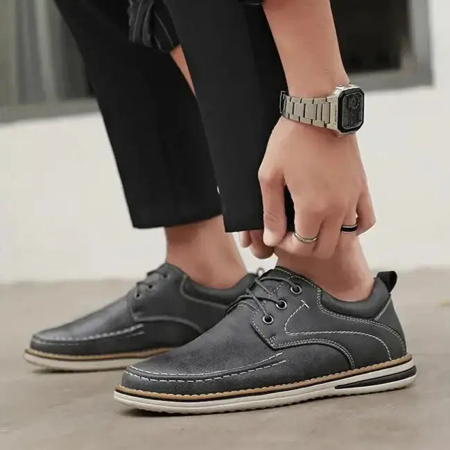 Luciano Genuine Leather Oxfords in black, featuring contrast stitching and a stylish design for everyday wear.